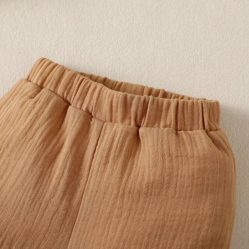 Conjunto Infantil Bege com Estampa de Dinossauro Lenogue