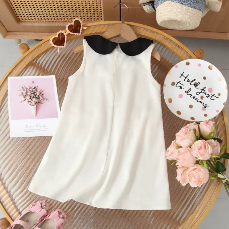 Vestido Infantil com Gola Boneca Laço e Bolsos sem Manga Lenogue