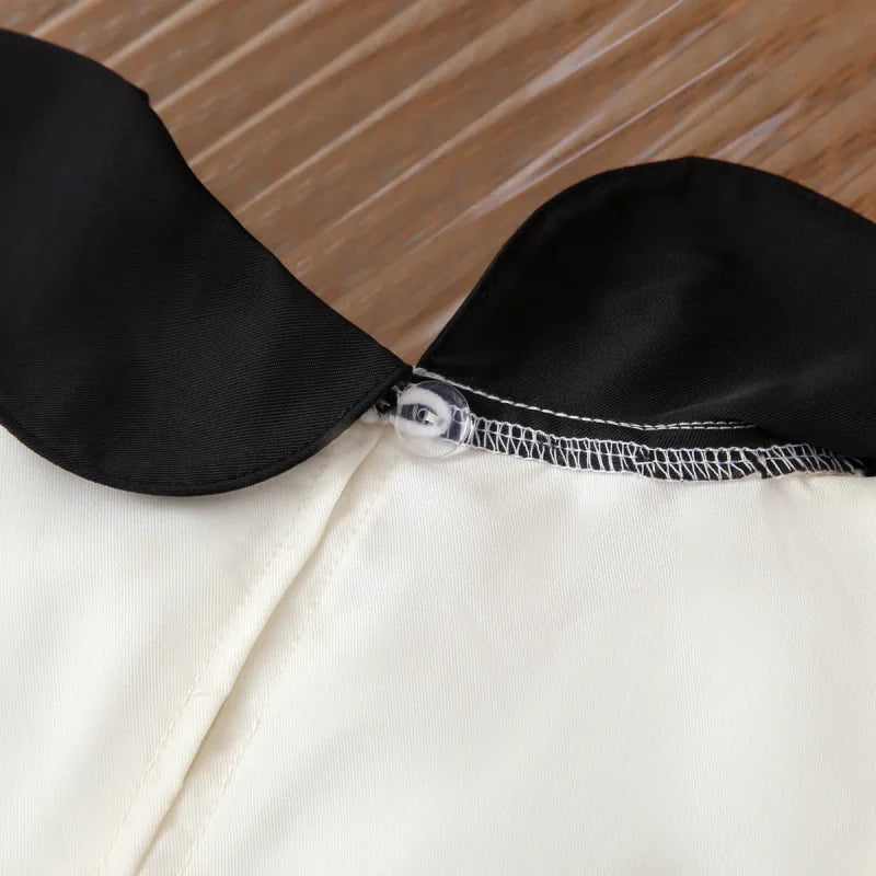 Vestido Infantil com Gola Boneca Laço e Bolsos sem Manga Lenogue