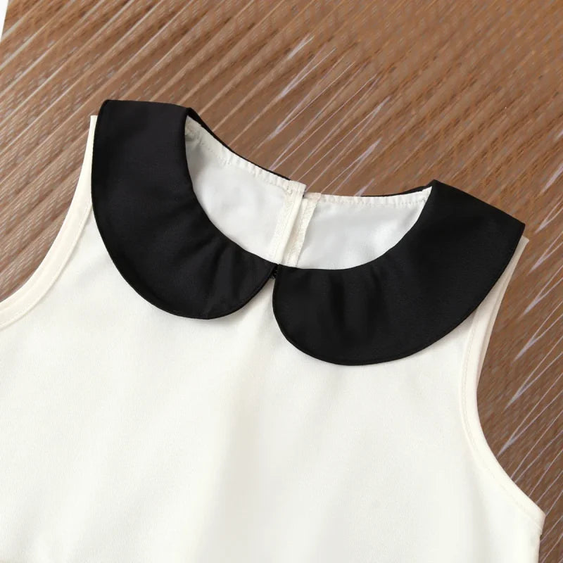 Vestido Infantil com Gola Boneca Laço e Bolsos sem Manga Lenogue