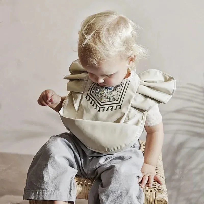 Babador Infantil com Bolsinho Nordic Mood Cinza Lenogue Elegante e Funcional