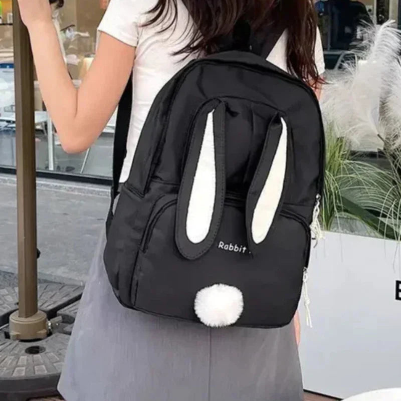 Mochila Escolar de Nylon com Estampa de Coelho Lenogue Bege