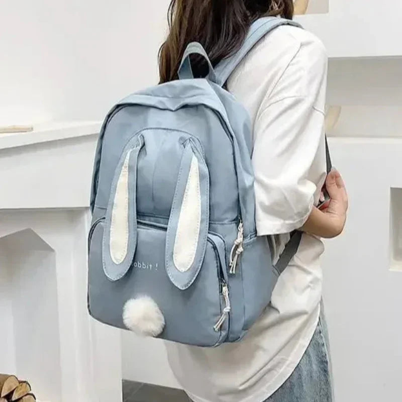 Mochila Escolar de Nylon com Estampa de Coelho Lenogue Marrom